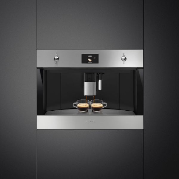 Smeg CMS4303X 45cm Classic Fully Automatic Coffee Machine in Stainless Steel _ front view in place with cup 