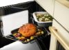 Rangemaster 15299 Deluxe 110 Induction Range Cooker in Gloss Black with Chrome Trim - ESDLB110EIPGBL/CM1_left oven