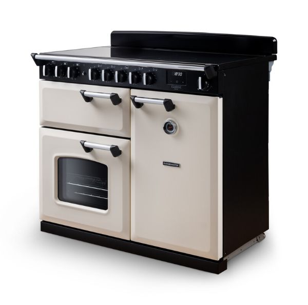 Rangemaster 14677 Classic Deluxe 100 Induction Range Cooker in Pale Cream with Chrome Trim - CLDL100EIPPCR/CM1_angled2